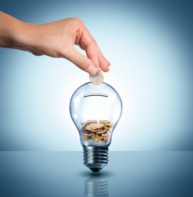 invest to energy concept – euro in bulb – piggybank