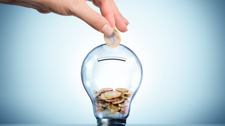 invest to energy concept – euro in bulb – piggybank