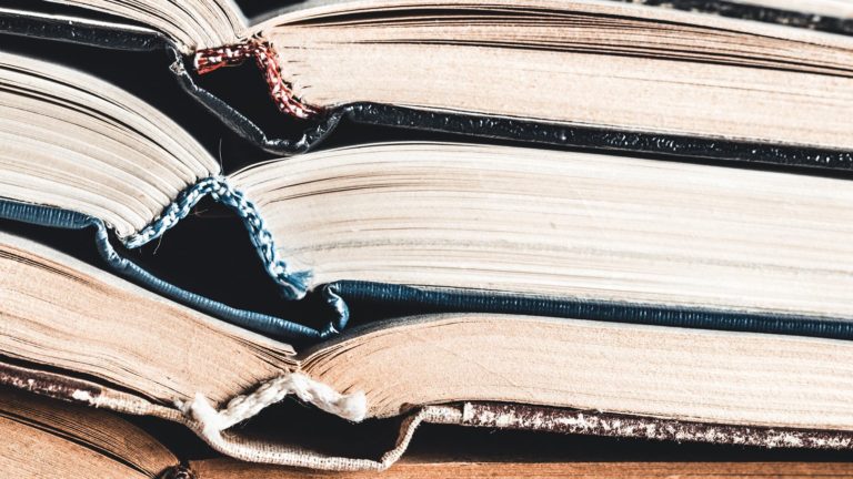 Open books close up as background