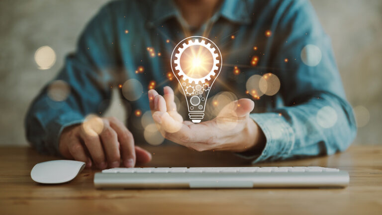 Innovation. Hands Holding Light Bulb For Concept New Idea Concep